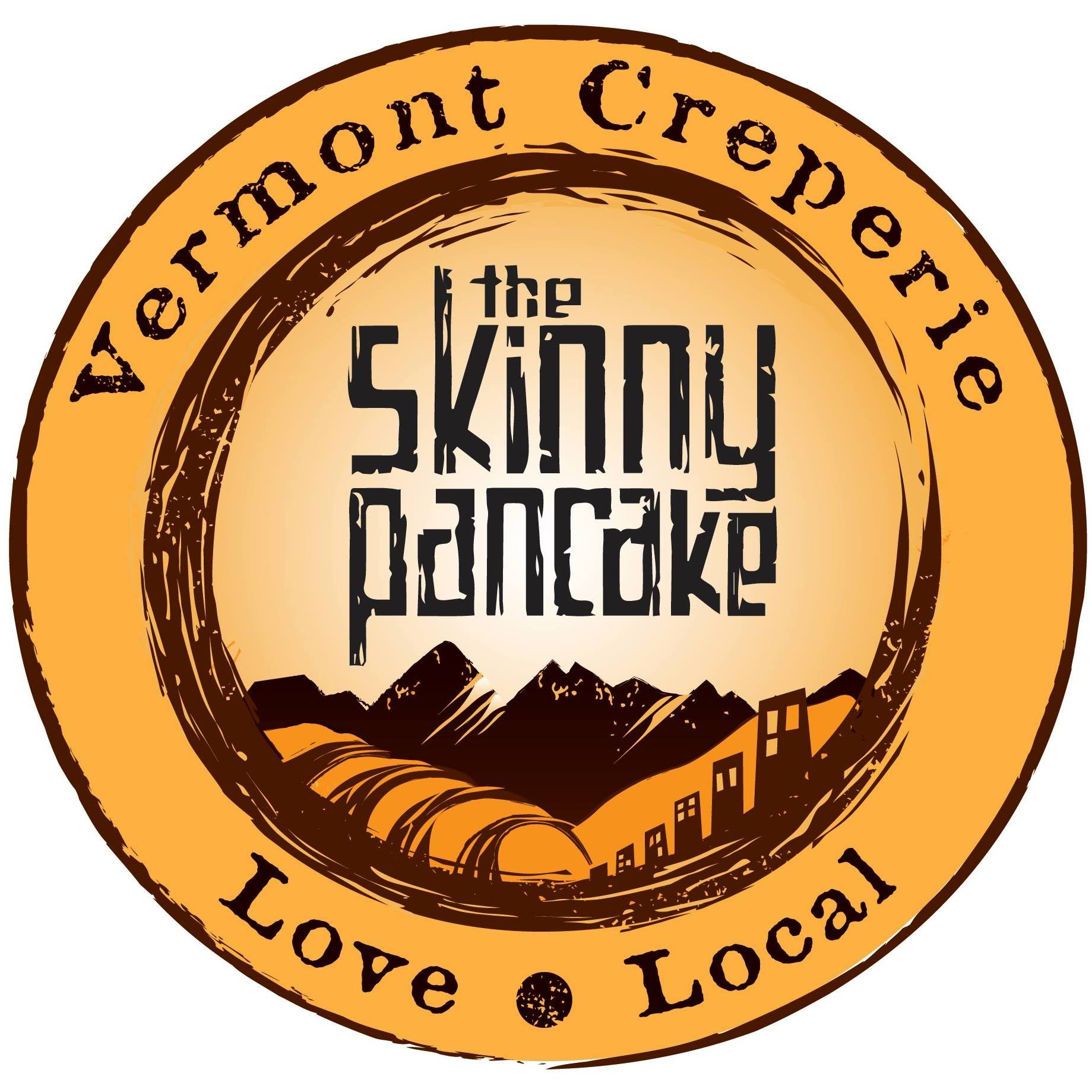 A logo for The Skinny Pancake. A circle with a light brown outer circle reads "Vermont Creperie, Love Local". An inner circle outlined in darker brown reads "the Skinny Pancake" with two loaves of bread in the lower portion of the circle.